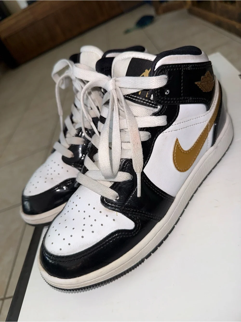 Nike High-Top Sneakers in White, Black & Gold